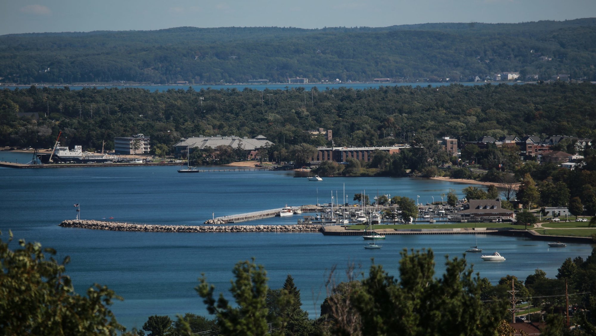 Traverse City condominiums overlooking Grand Traverse Bay, with scenic landscapes and urban amenities.