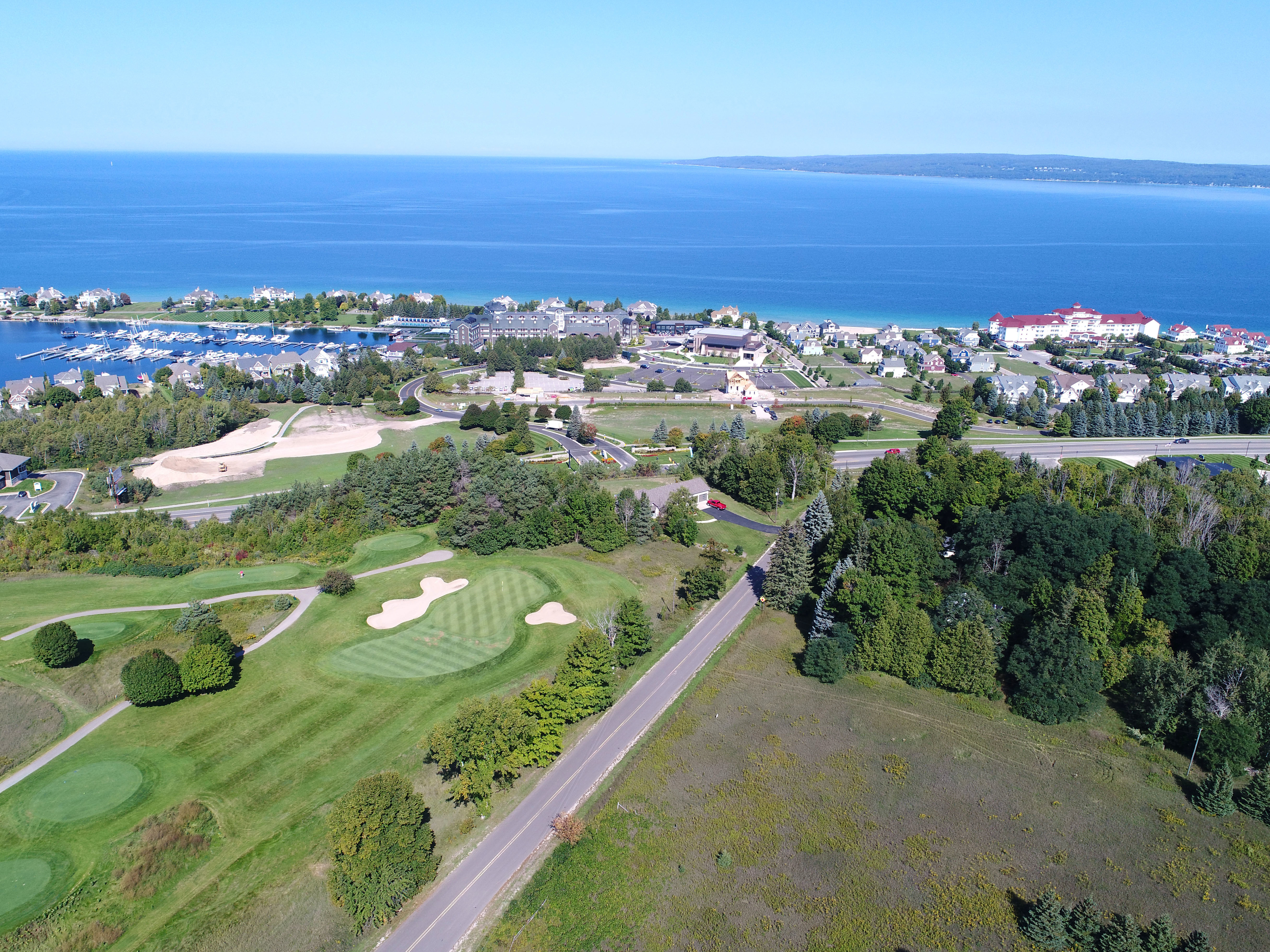 Aerial view of Bay Harbor, Michigan, with single-family homes for sale