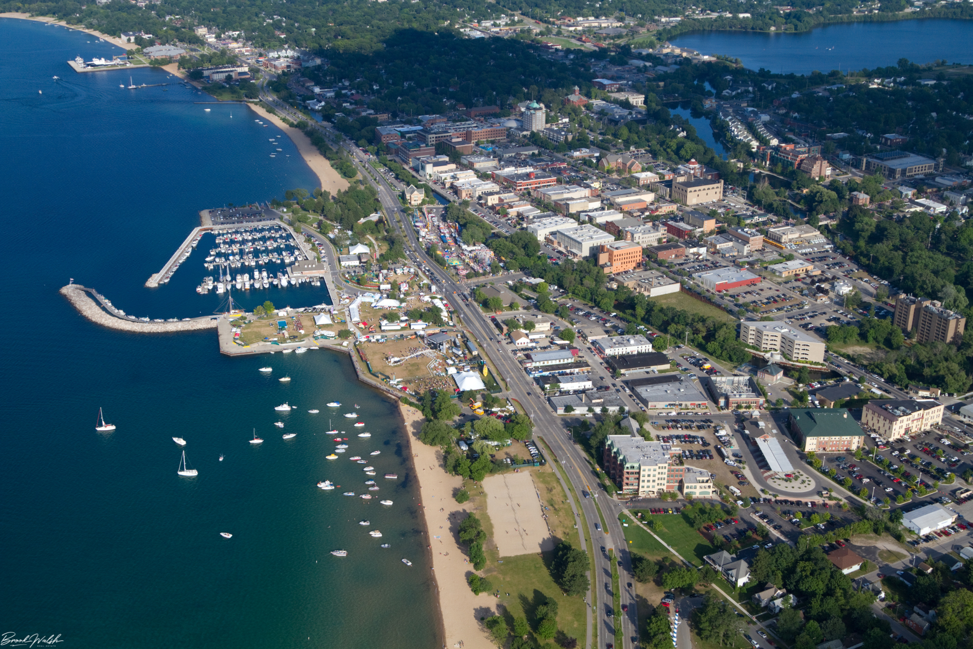 Traverse City waterfront with a lighthouse and beach, perfect for first-time visitors.
