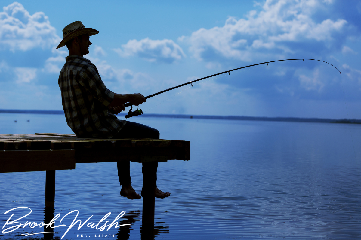 Angler fishing at Walloon Lake during early morning hours
