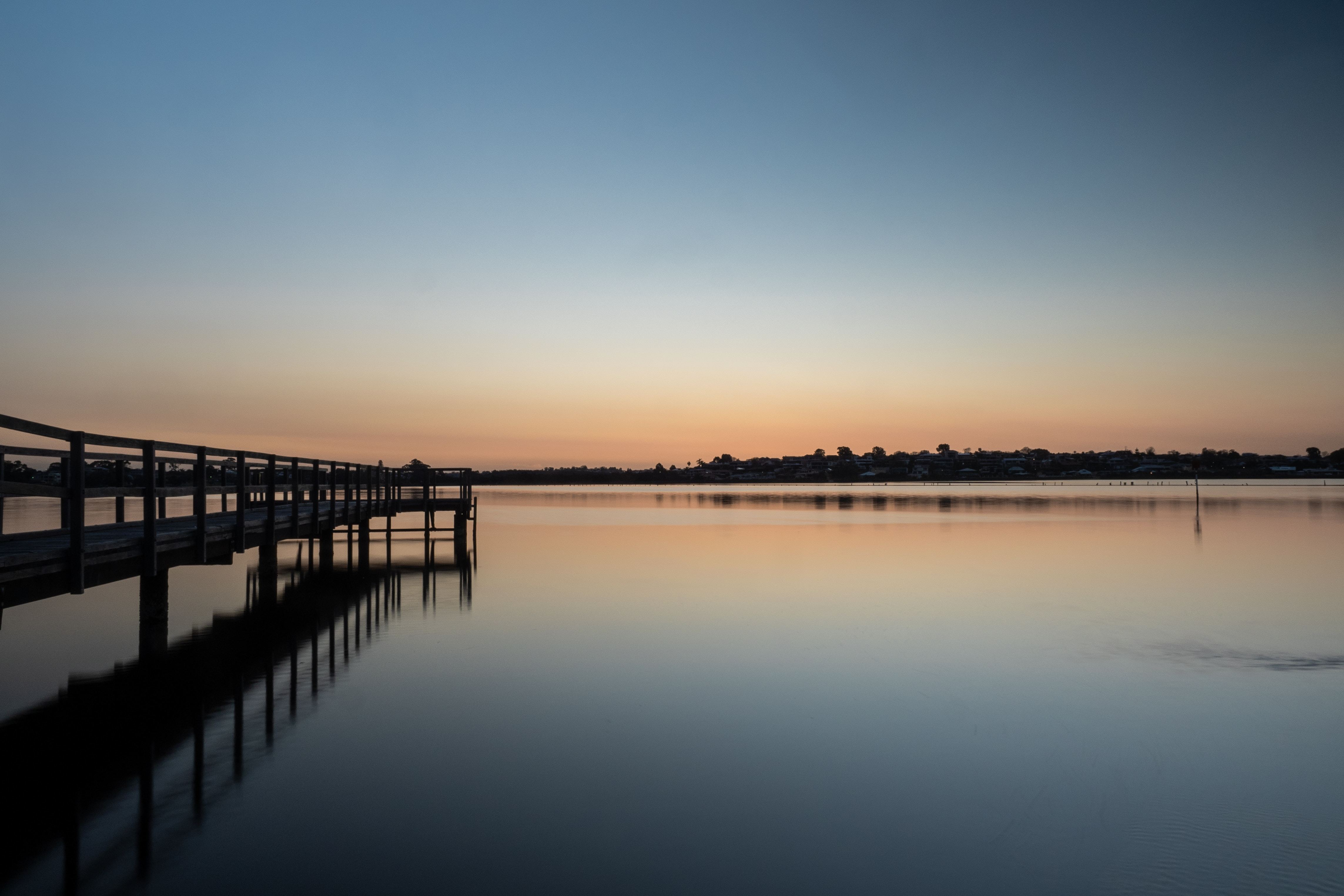 Scenic view of Mullett Lake in Northern Michigan with a boat on the water.