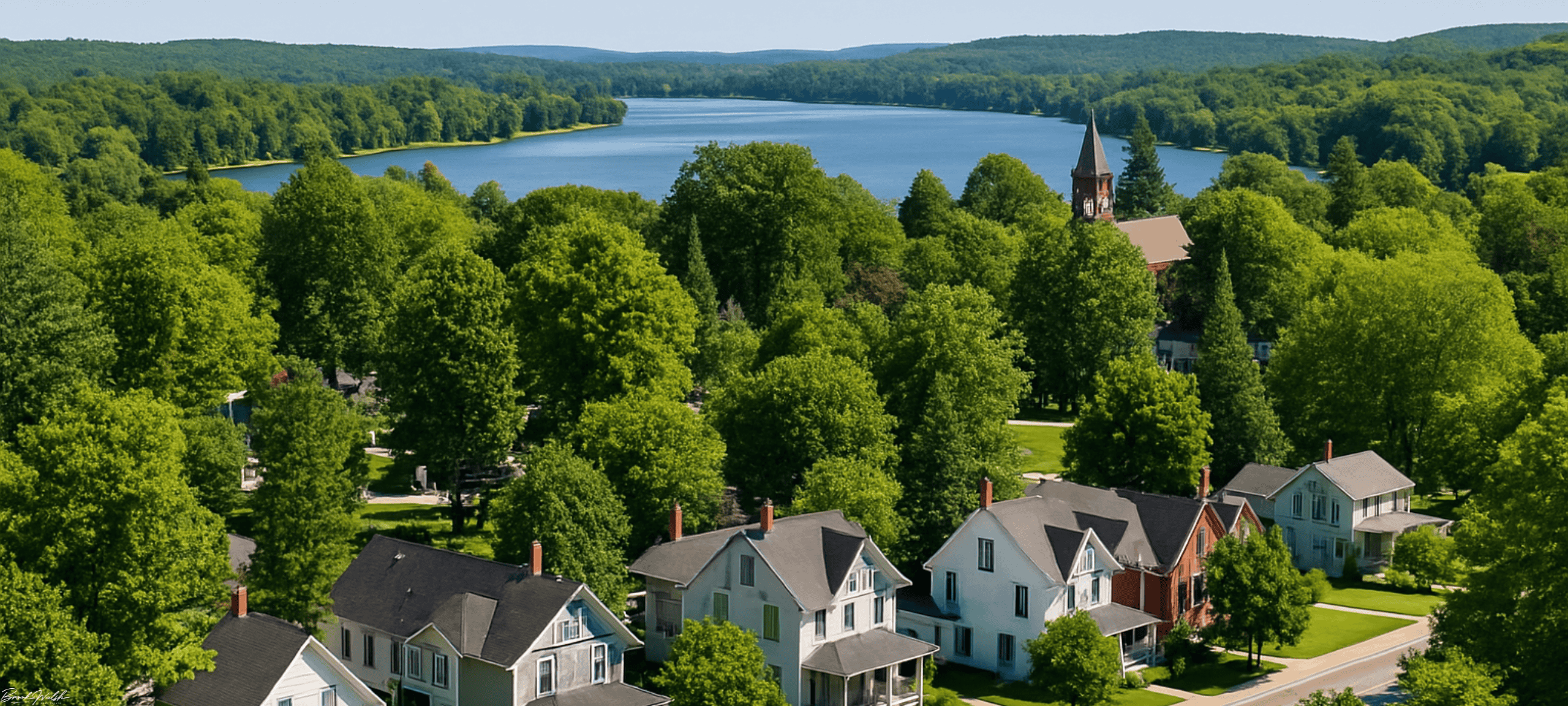 Scenic view of Bellaire, MI downtown homes near lakes and parks