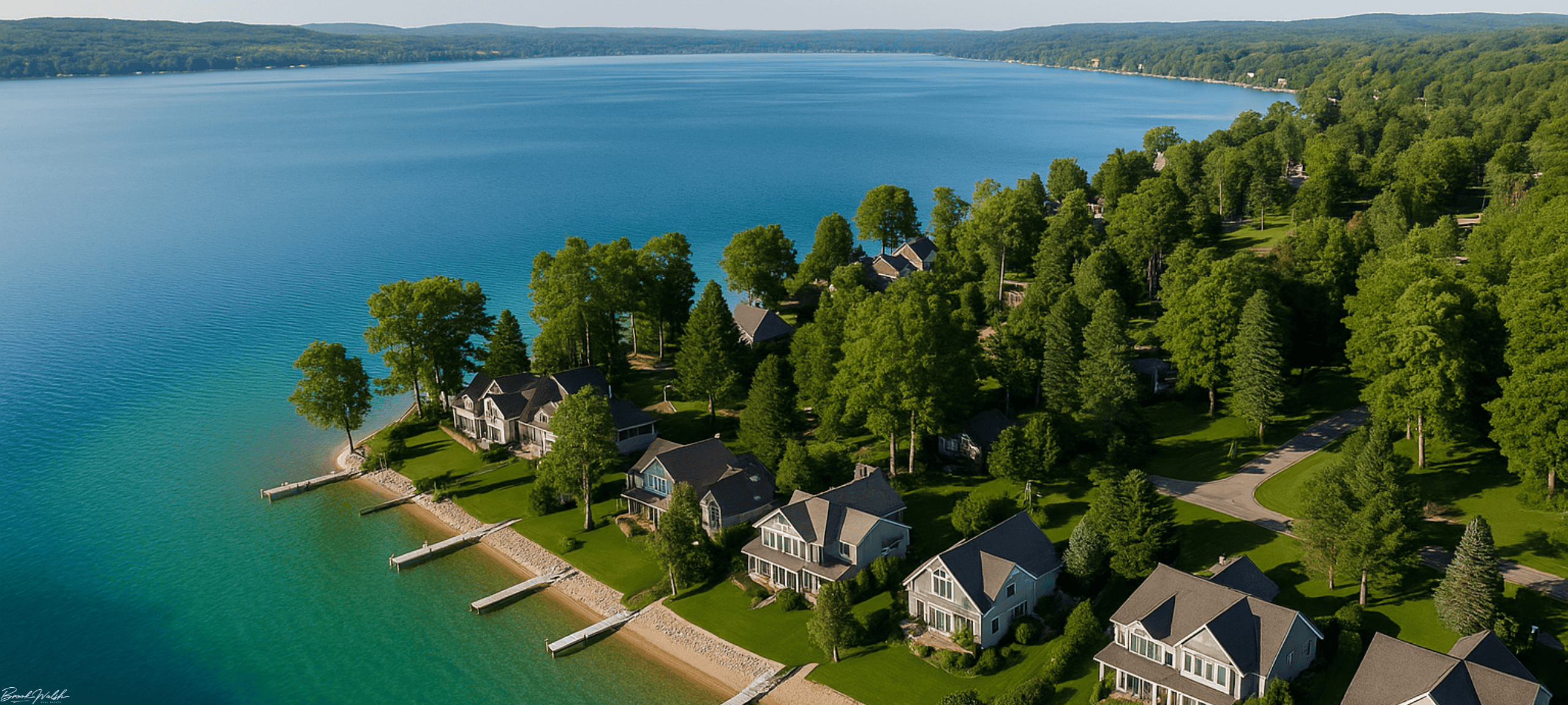 Aerial view of Crystal Lake waterfront homes in Beulah, MI