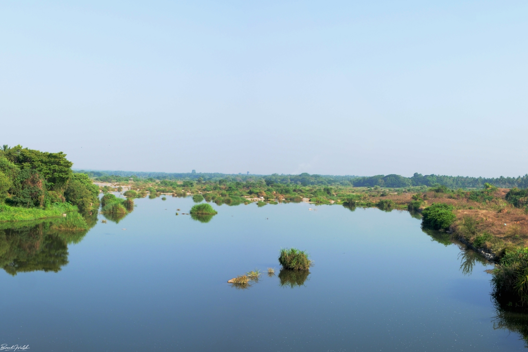 Scenic view of Brutus, Michigan with lush green landscapes and a charming village.