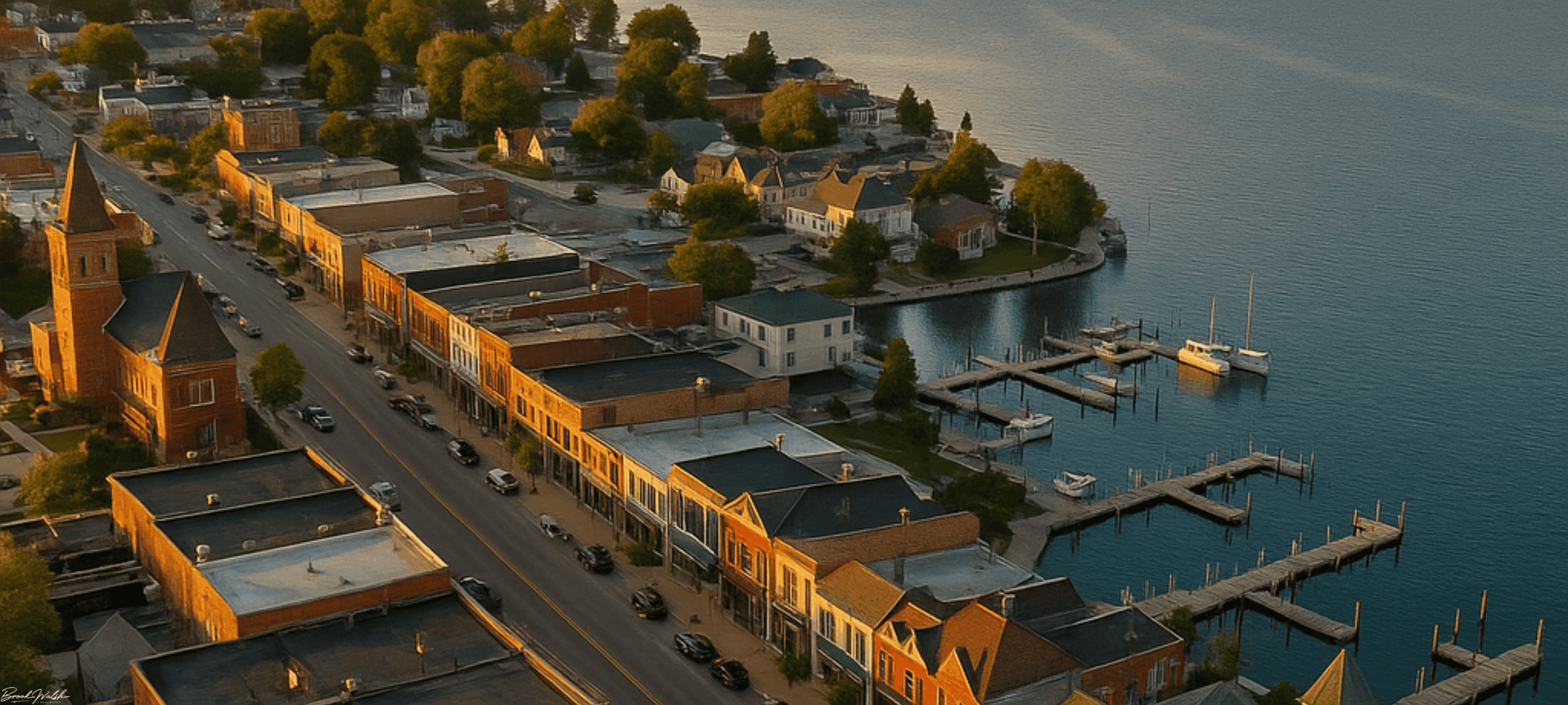 Aerial view of downtown Charlevoix showcasing prime commercial real estate properties