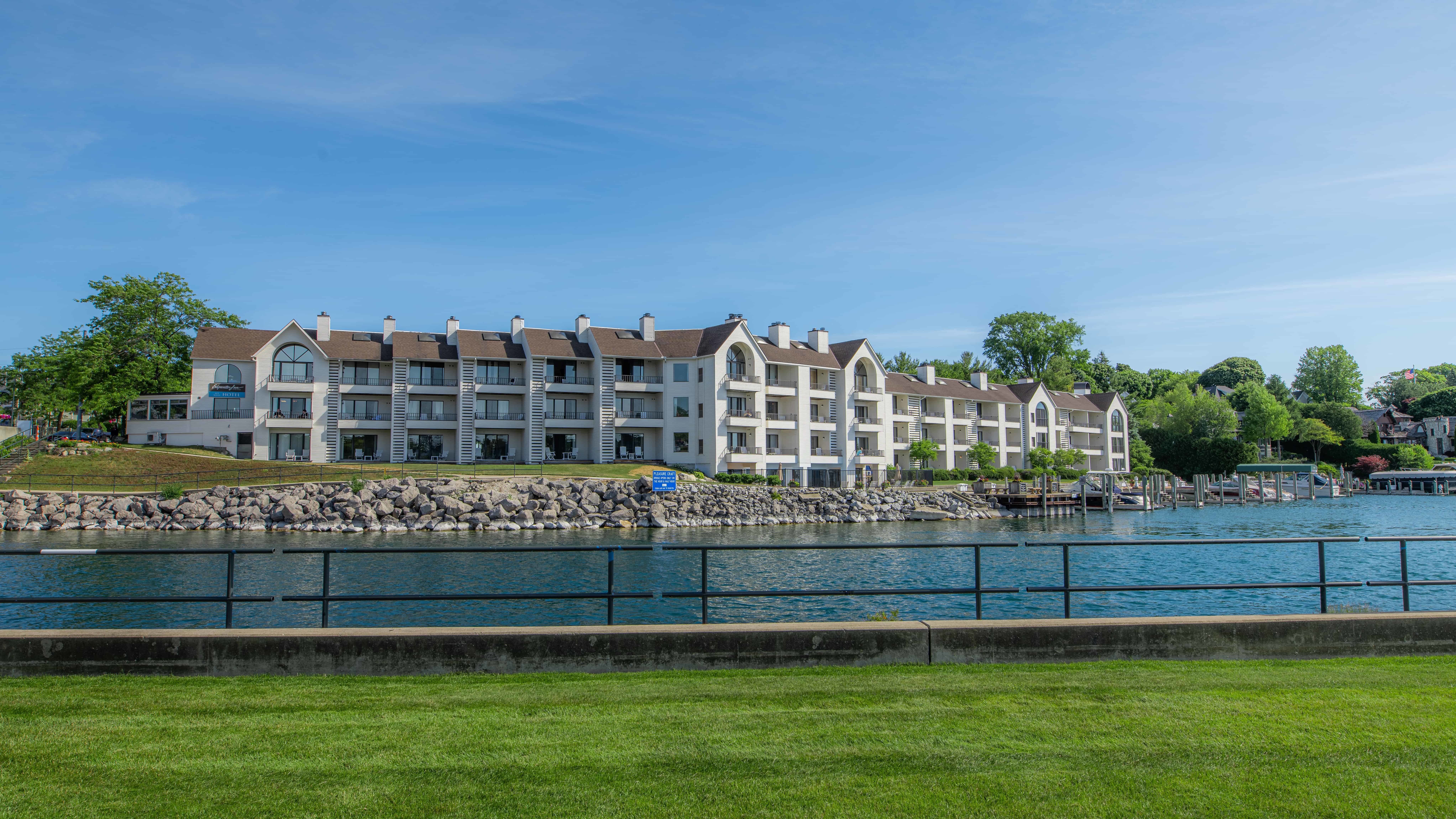 Luxurious suite interior at Pointes North Inn, Charlevoix, overlooking the water.