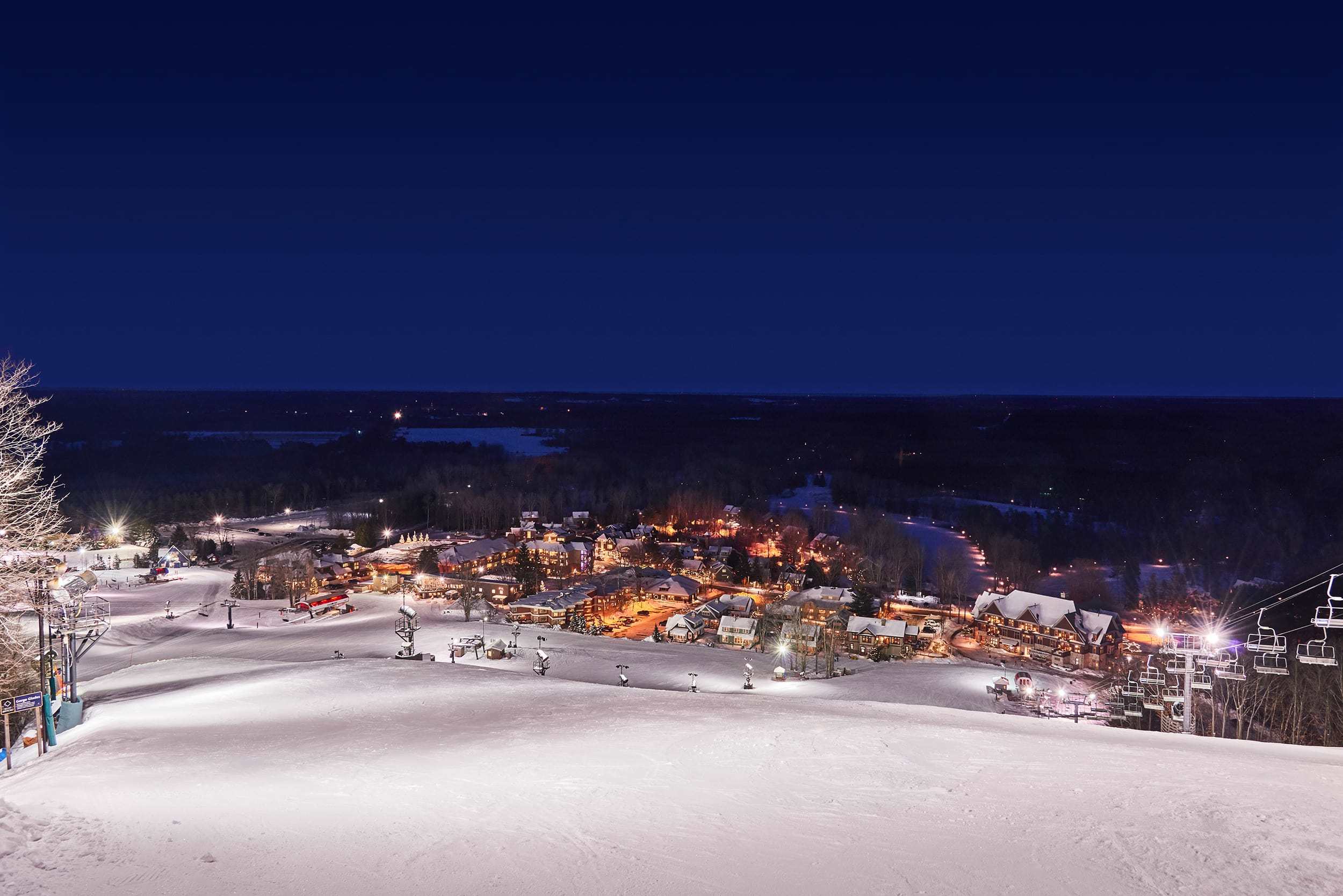 Scenic view of Crystal Mountain Resort in Thompsonville, MI with outdoor activities.