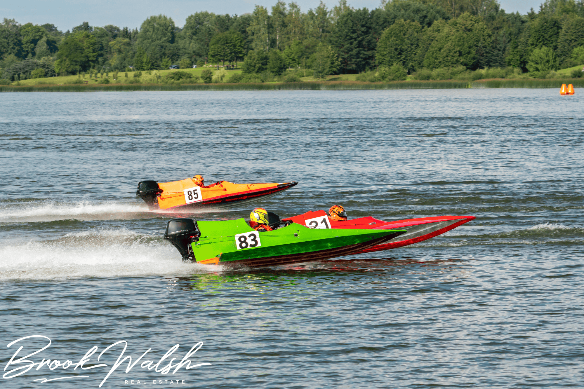 Boats racing on Lake Charlevoix during the 2025 Poker Run event