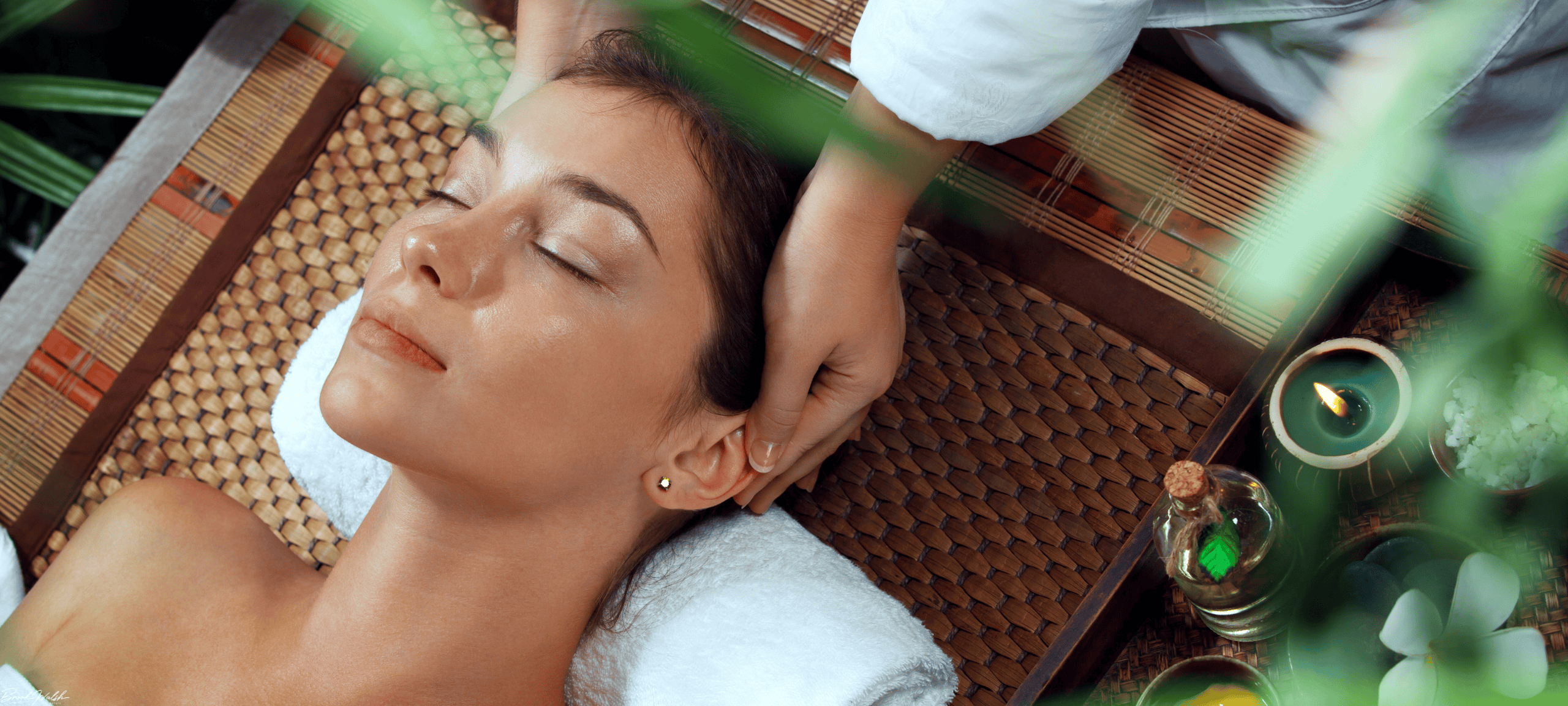 Woman relaxing at Boyne Mountain Spa with a soothing massage in Northern Michigan