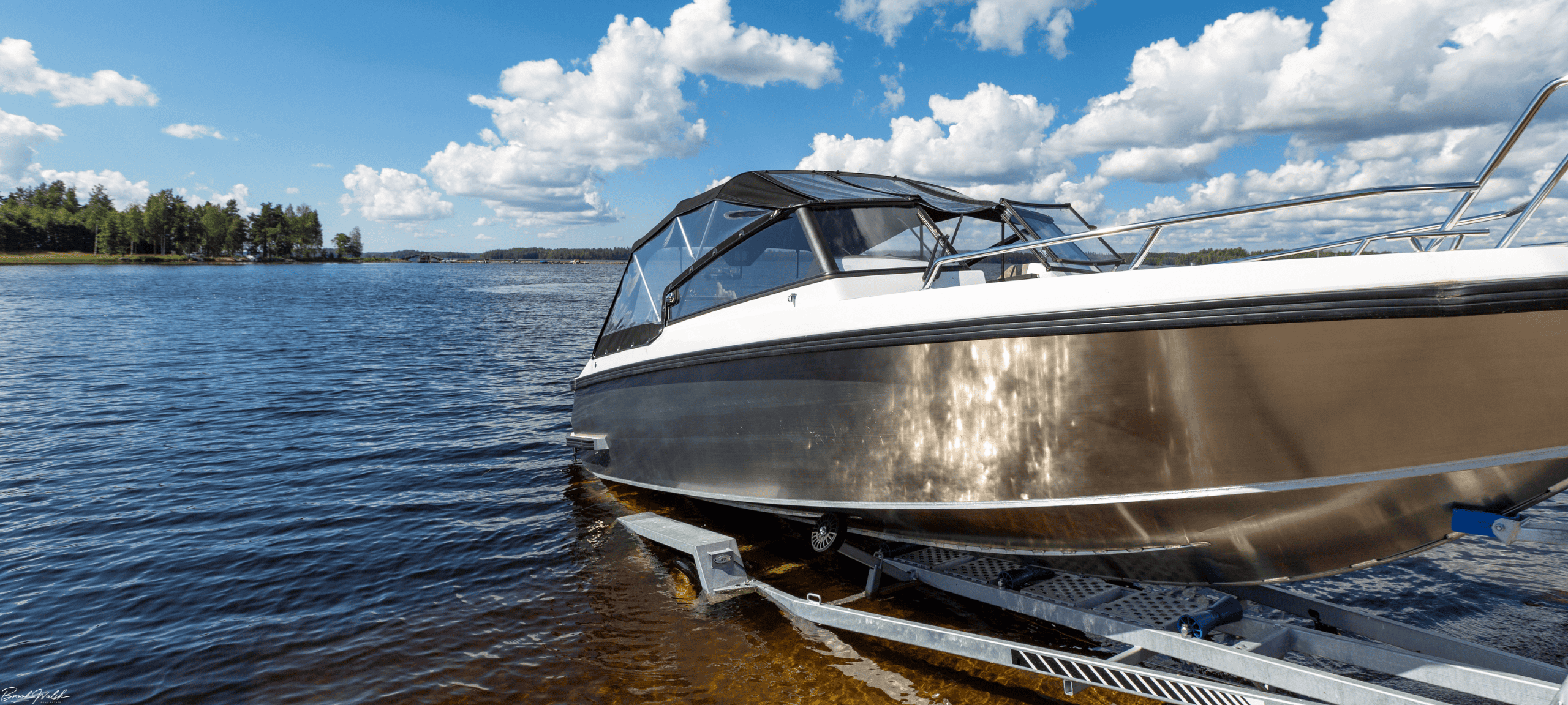 Aerial view of Walloon Lake boat launch with dock and boats