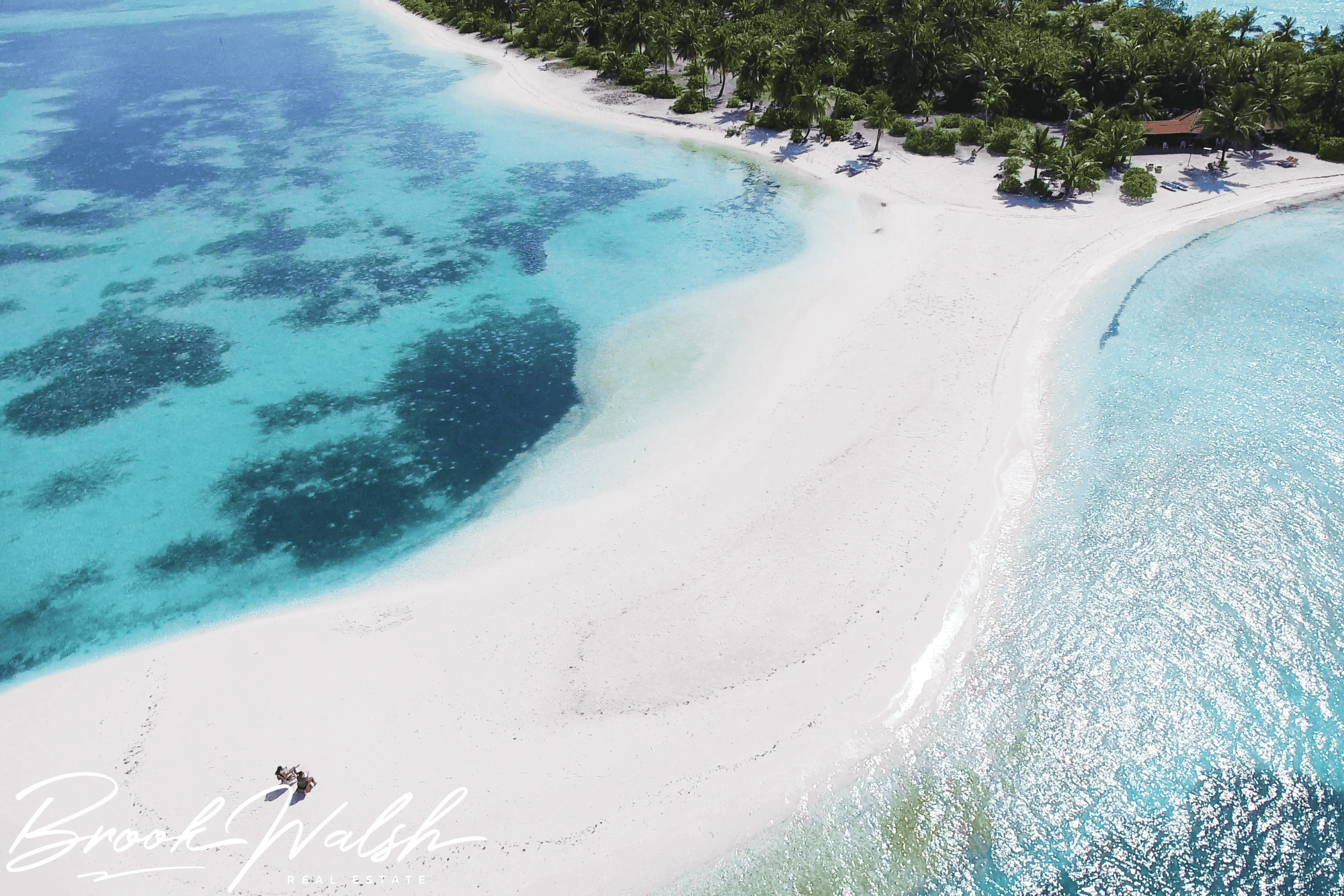 Boats anchored on Walloon Lake Sandbar under sunny skies
