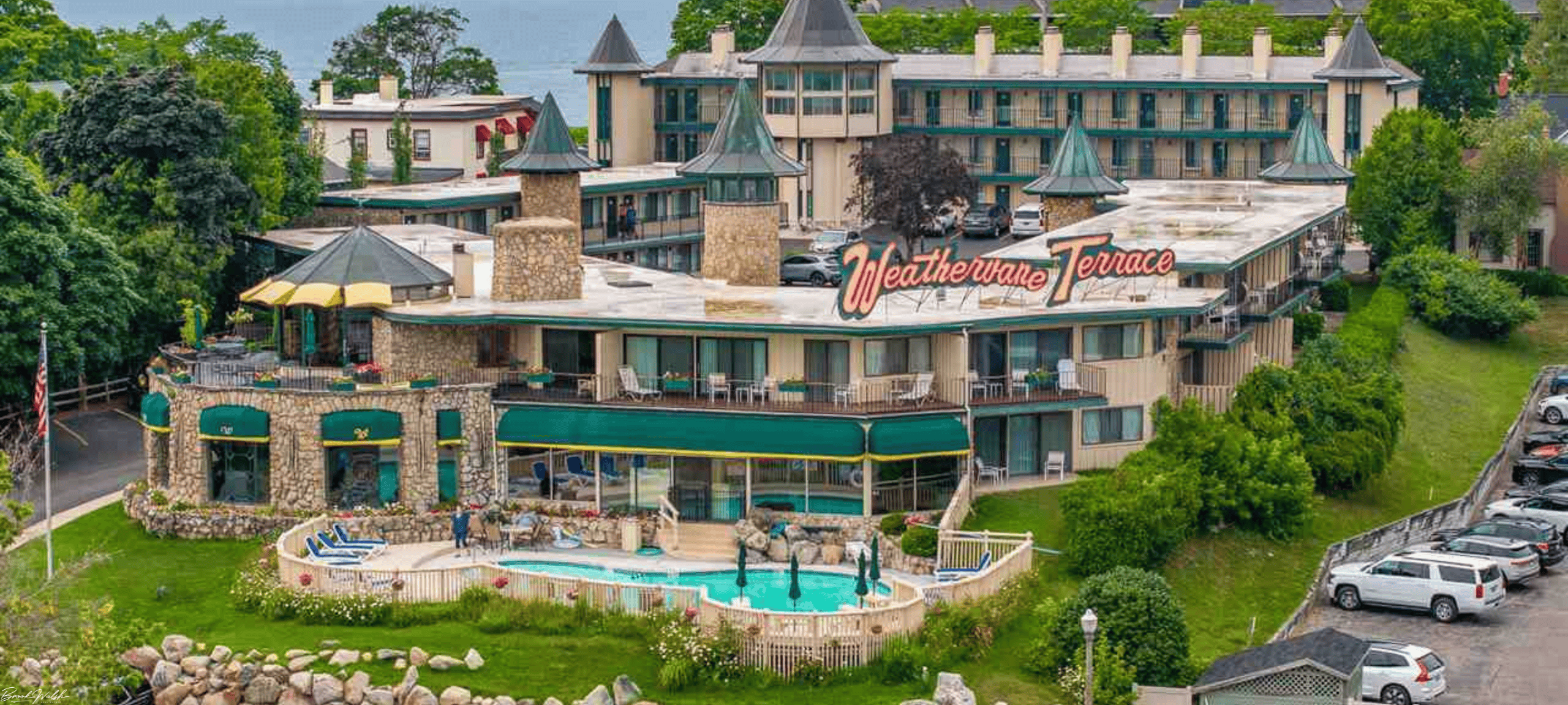 Scenic view of Weathervane Inn Condominiums on the waterfront in Charlevoix, MI